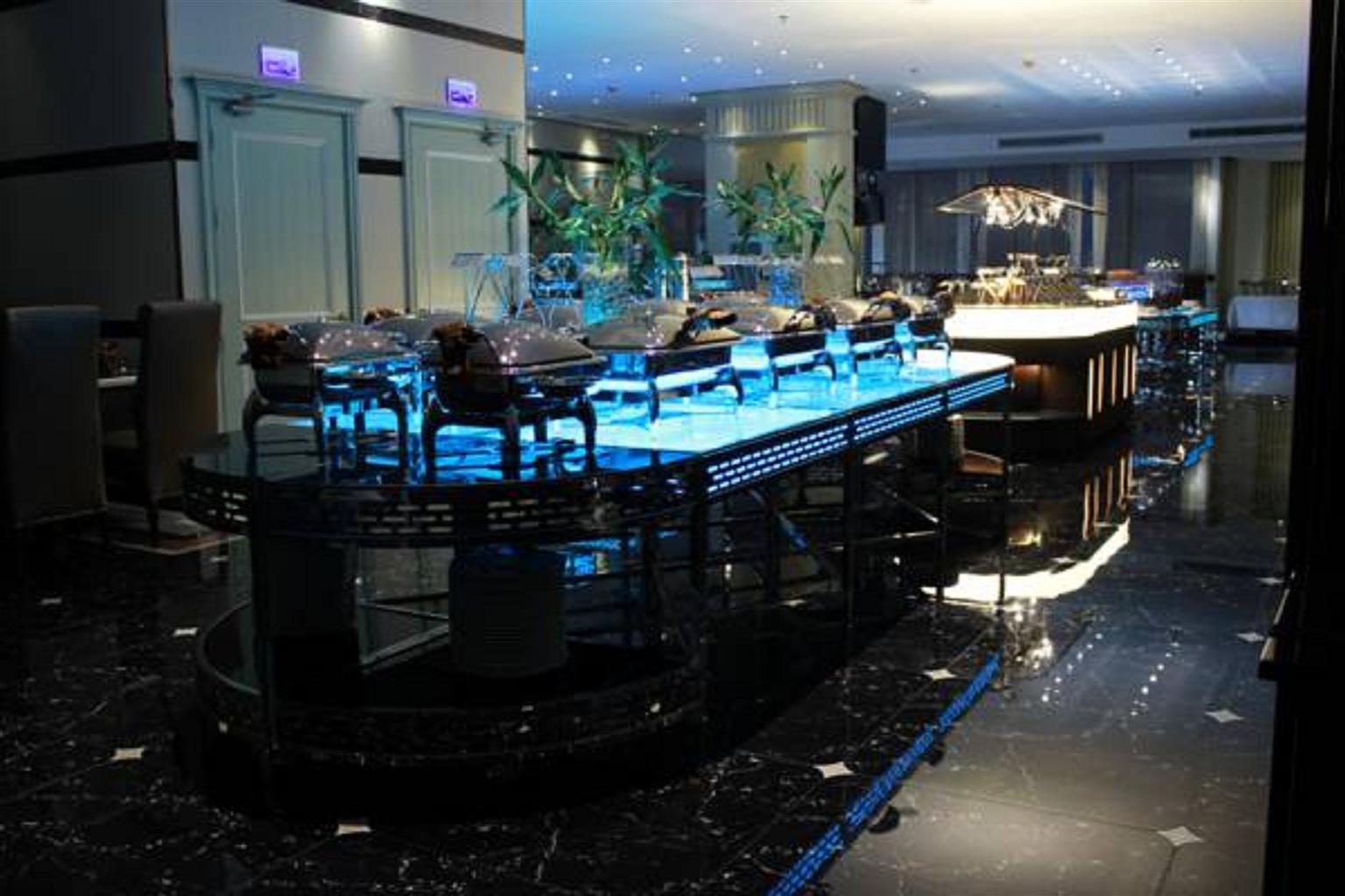 Al Ahsa Grand Serviced Apartment Al-Hofuf Exterior photo The bar at the lobby