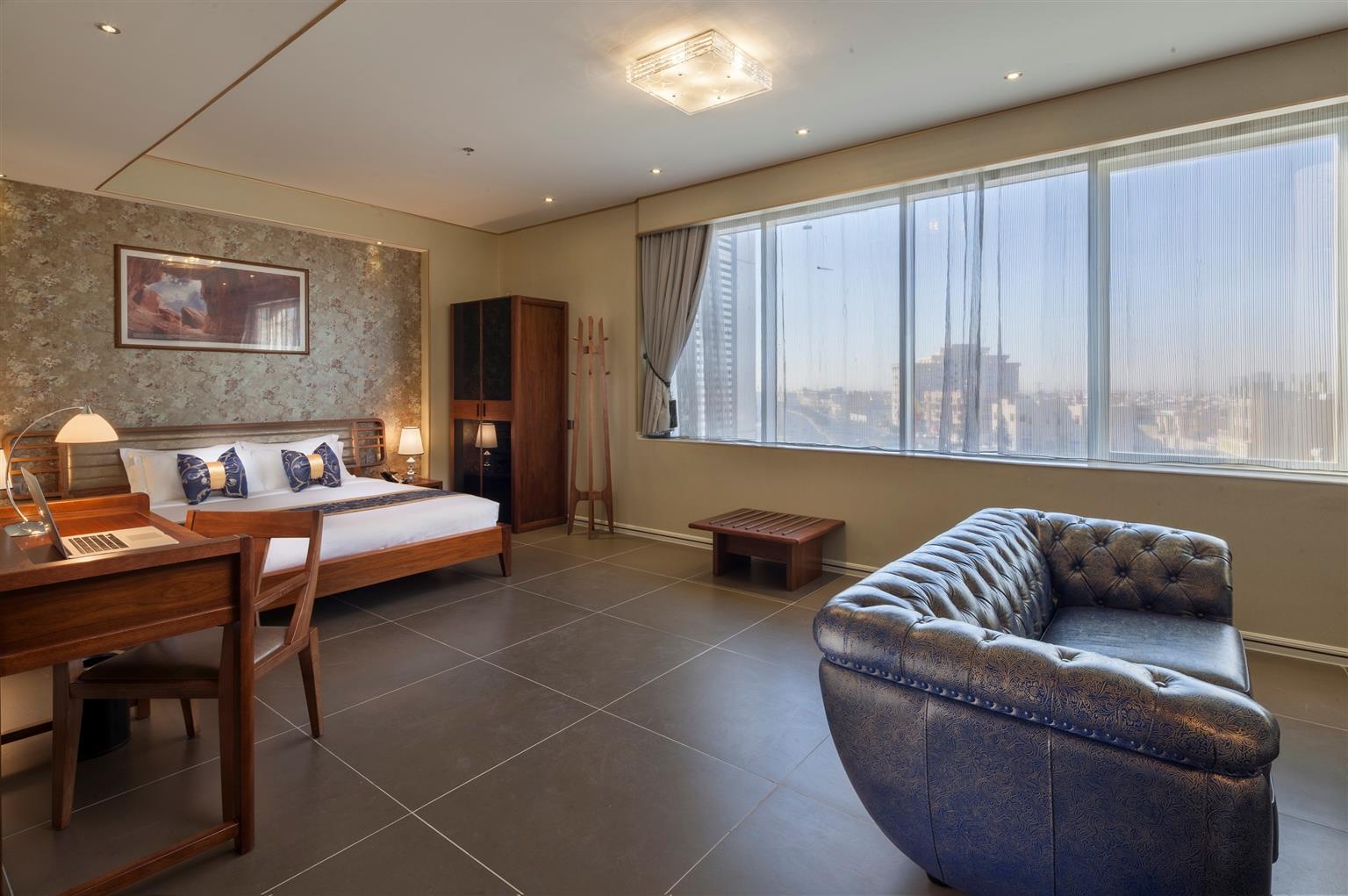 Al Ahsa Grand Serviced Apartment Al-Hofuf Exterior photo A suite at the hotel