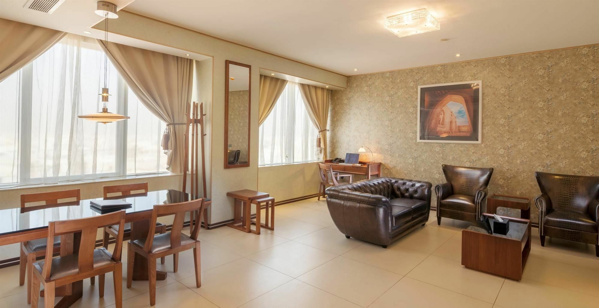 Al Ahsa Grand Serviced Apartment Al-Hofuf Exterior photo A living room in a suite at the Grand Hotel